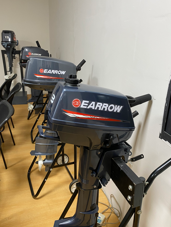 Outboard motor earrow